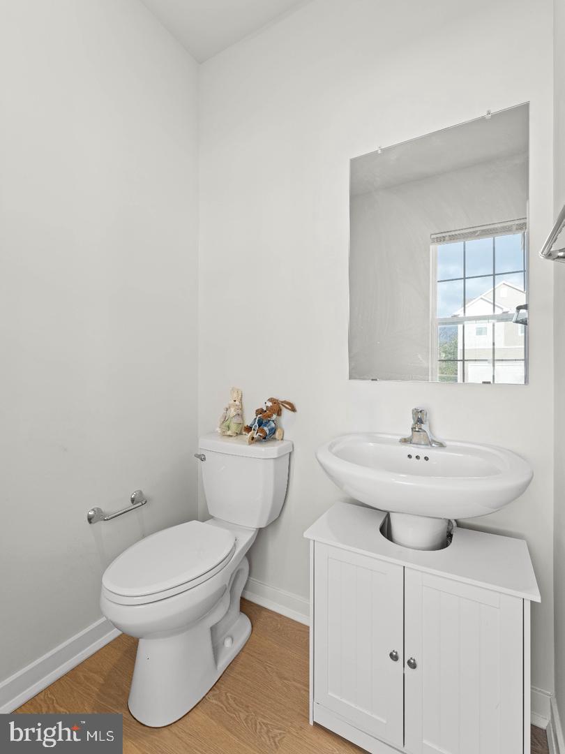 12 Handbell Lane Sicklerville, NJ 08081 - Photo 5 of 30 a bathroom with a sink a toilet and mirror