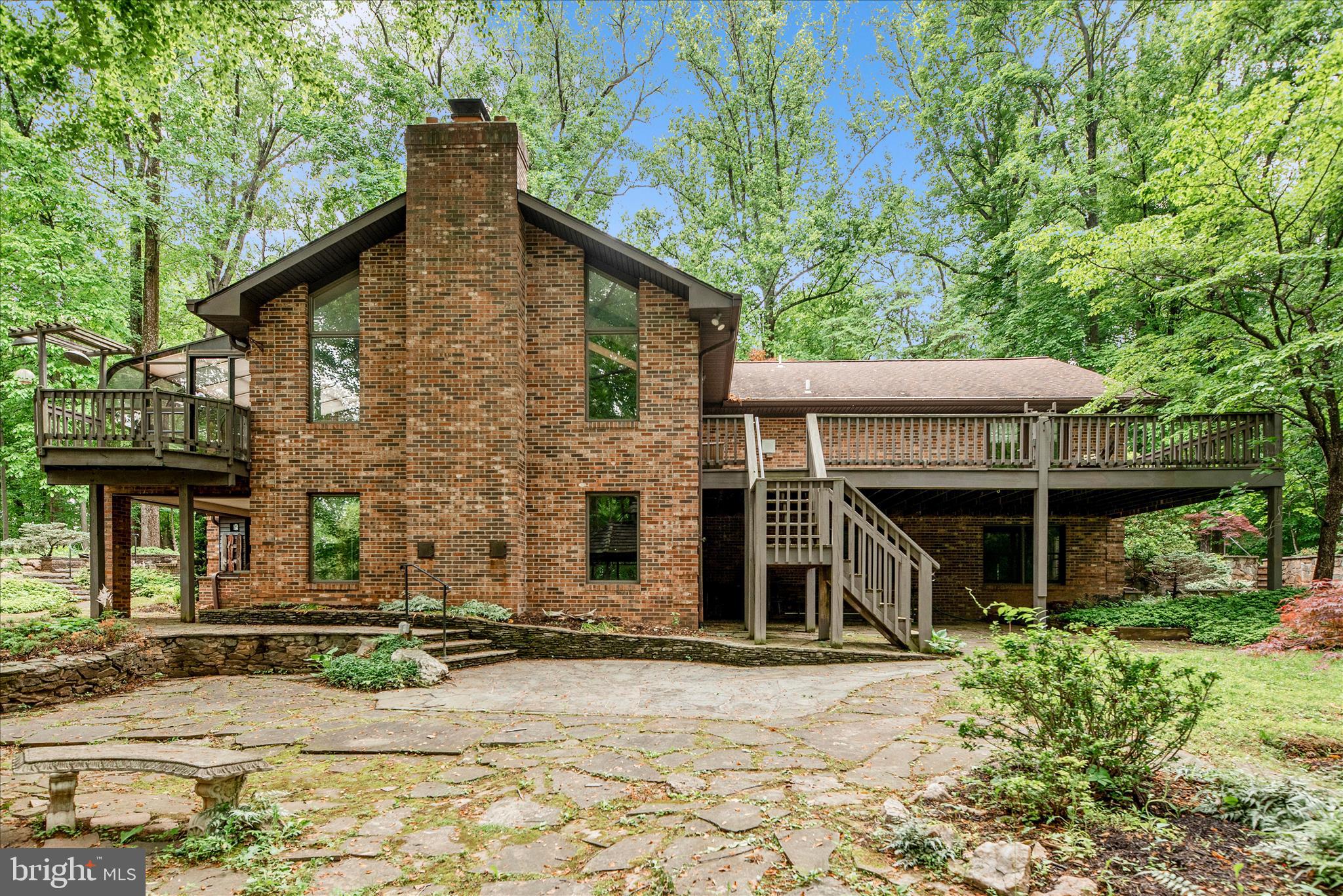 2221 Gold Mine Road Brookeville, MD 20833 - Photo 46 of 60 a front view of a house with a yard