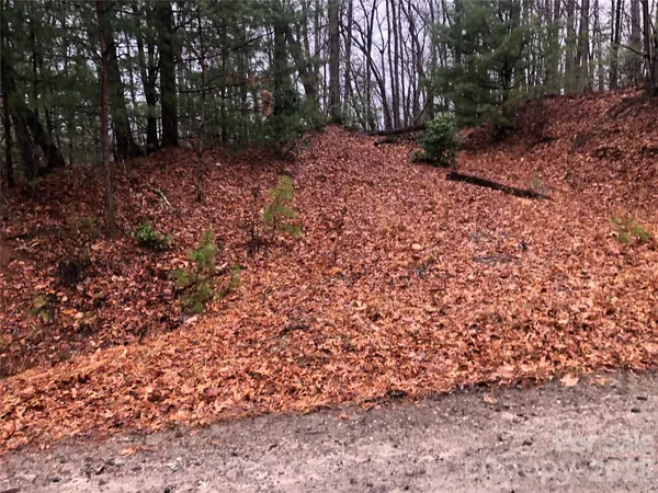 view of a wooden floor with a bench