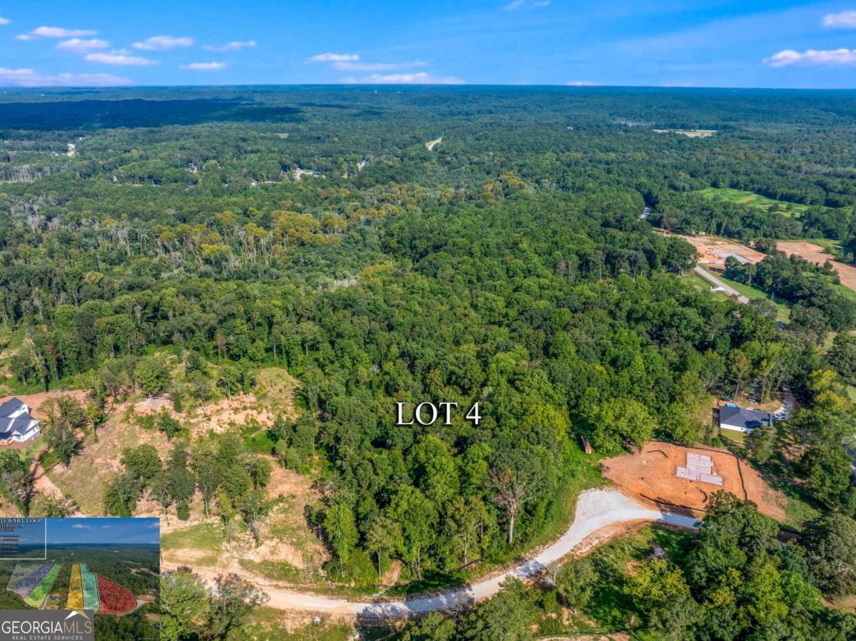 Lot 4 Stewart Loop Jefferson, GA 30549 - Photo 4 of 12 a view of a yard with a house