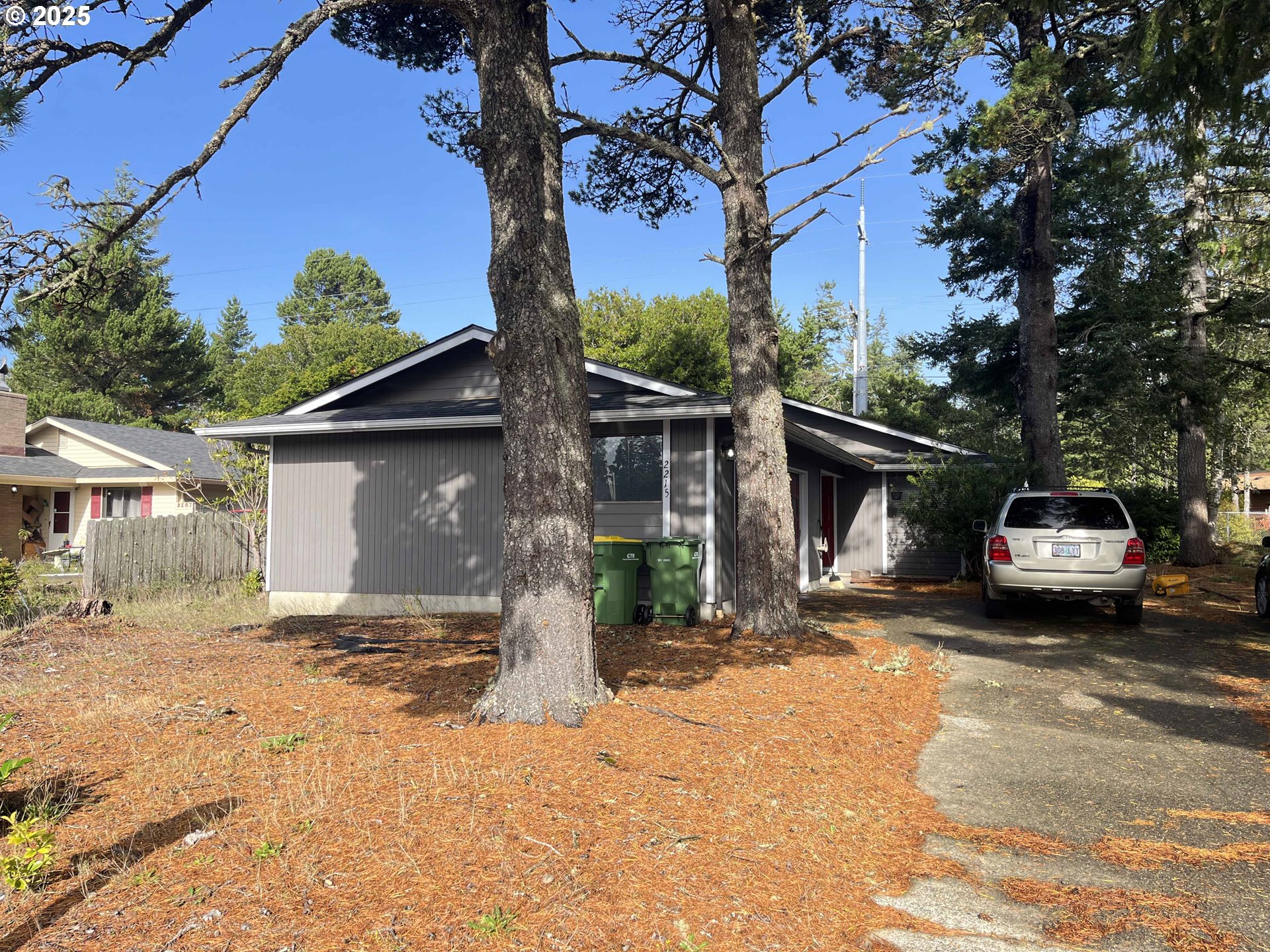 a house with trees in the background
