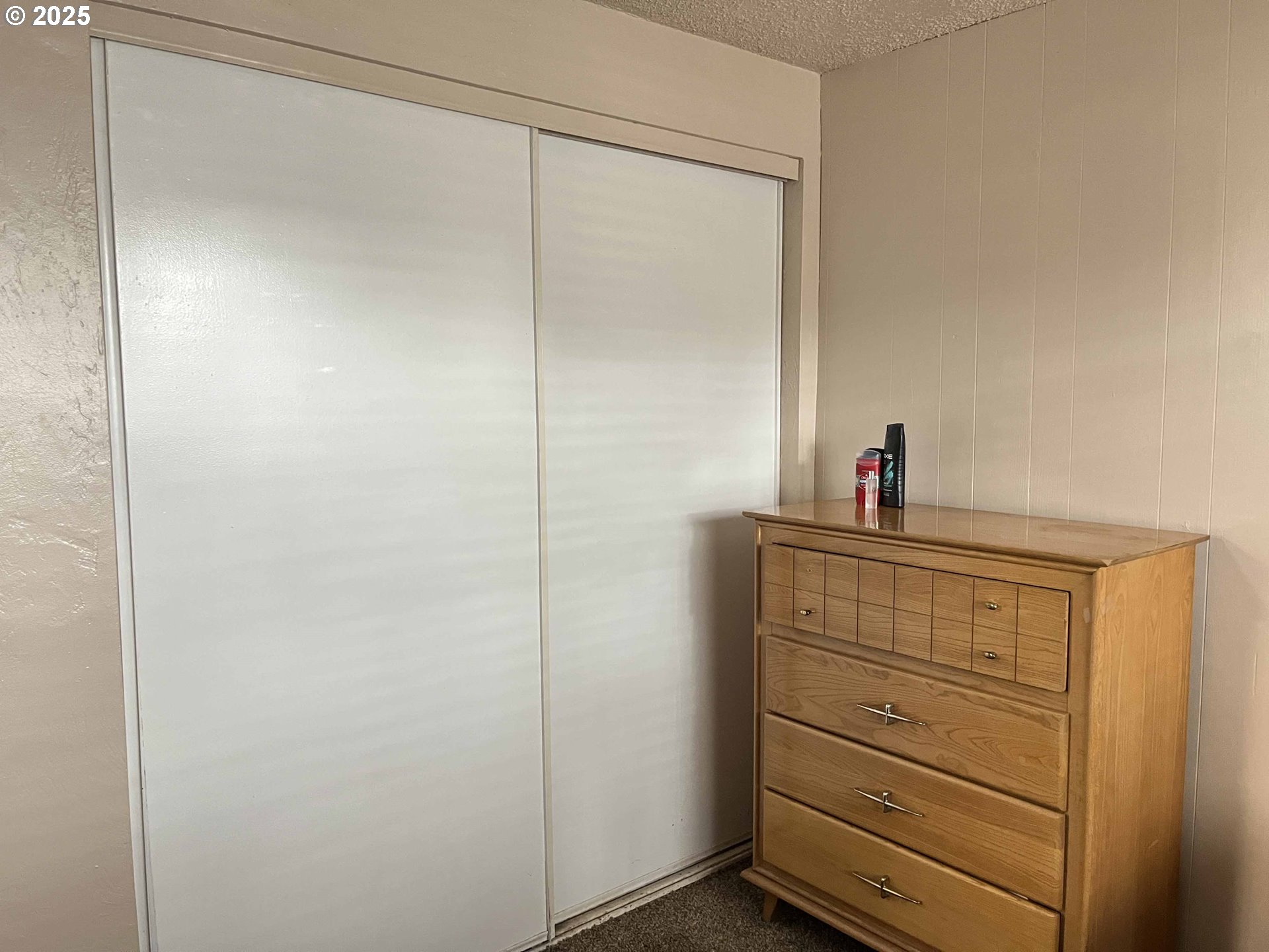 2215 24th Street Florence, OR 97439 - Photo 28 of 31 a room with storage and a walk in closet