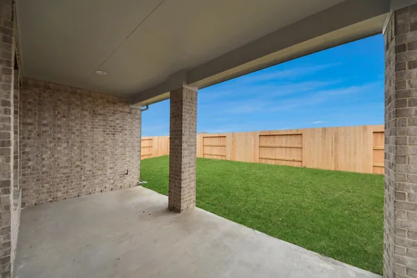 a view of a back yard of the house