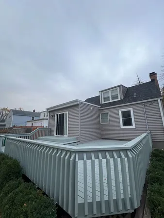 a view of a house from a deck