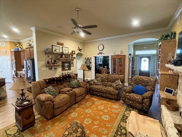 a bathroom with a granite countertop tub sink a mirror a shower and vanity