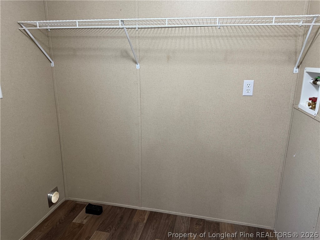 4339 Saddletree Road Lumberton, NC 28360 - Photo 13 of 23 a view of a room with racks on the wall