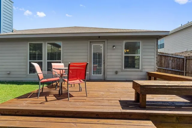 a backyard of a house with seating space