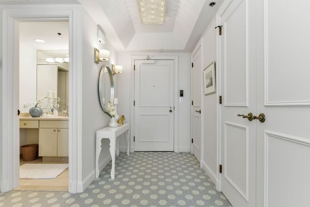 a view of a bathroom with tub and shower