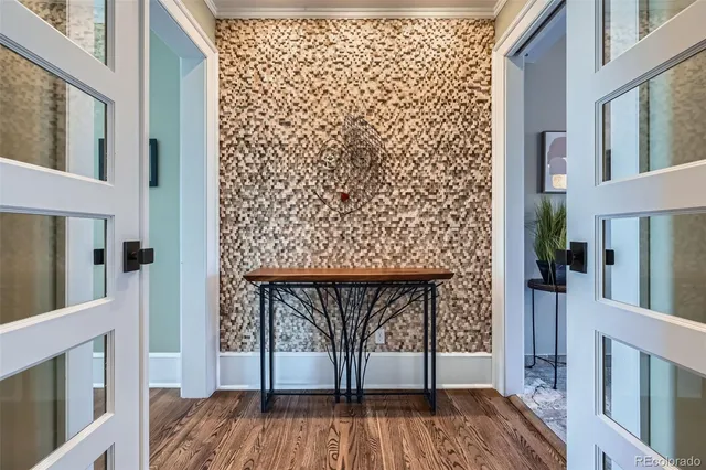 a view of entryway with wooden floor