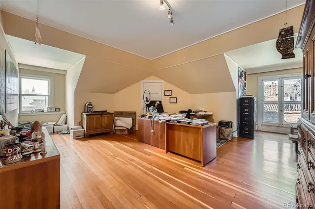 a view of a living room and dining room