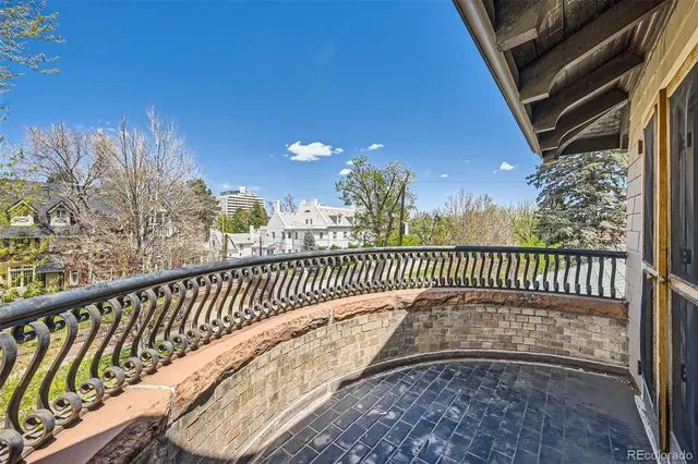 a view of a balcony with a swing