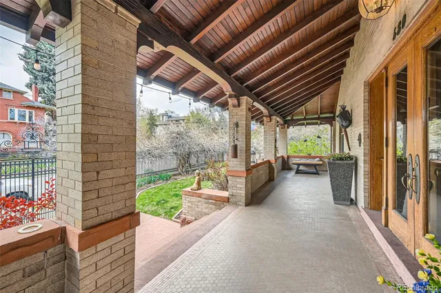 a view of a porch with furniture