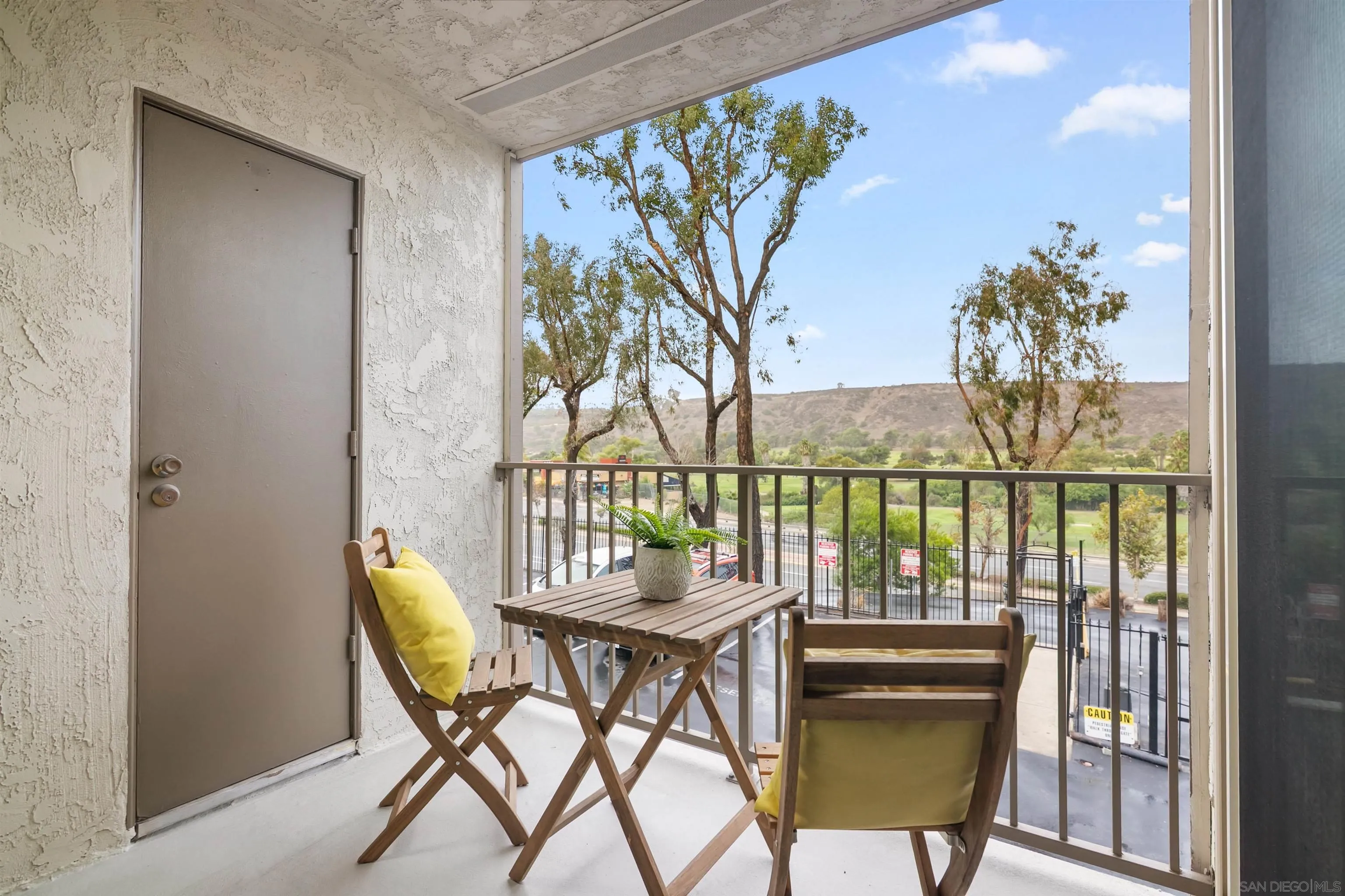 6675 Mission Gorge Road, Unit B104 San Diego, CA 92120 - Photo 12 of 14 a dining room with furniture and a floor to ceiling window