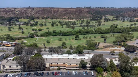 an aerial view of a town with couple of houses