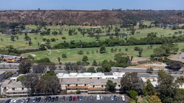 an aerial view of a town with couple of houses