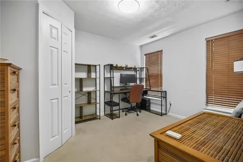 a room with furniture and a window