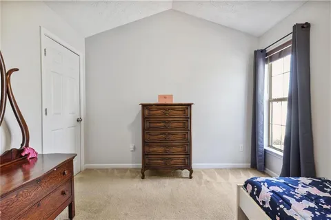 a view of room with furniture and entryway