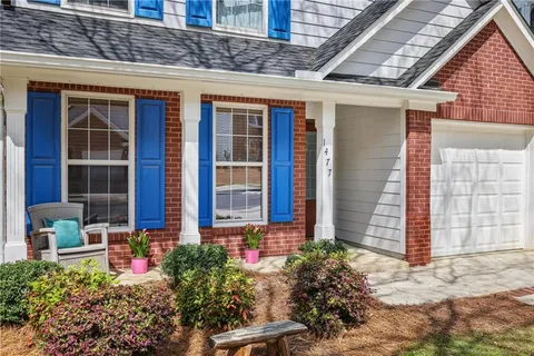 a front view of a house with an outdoor space