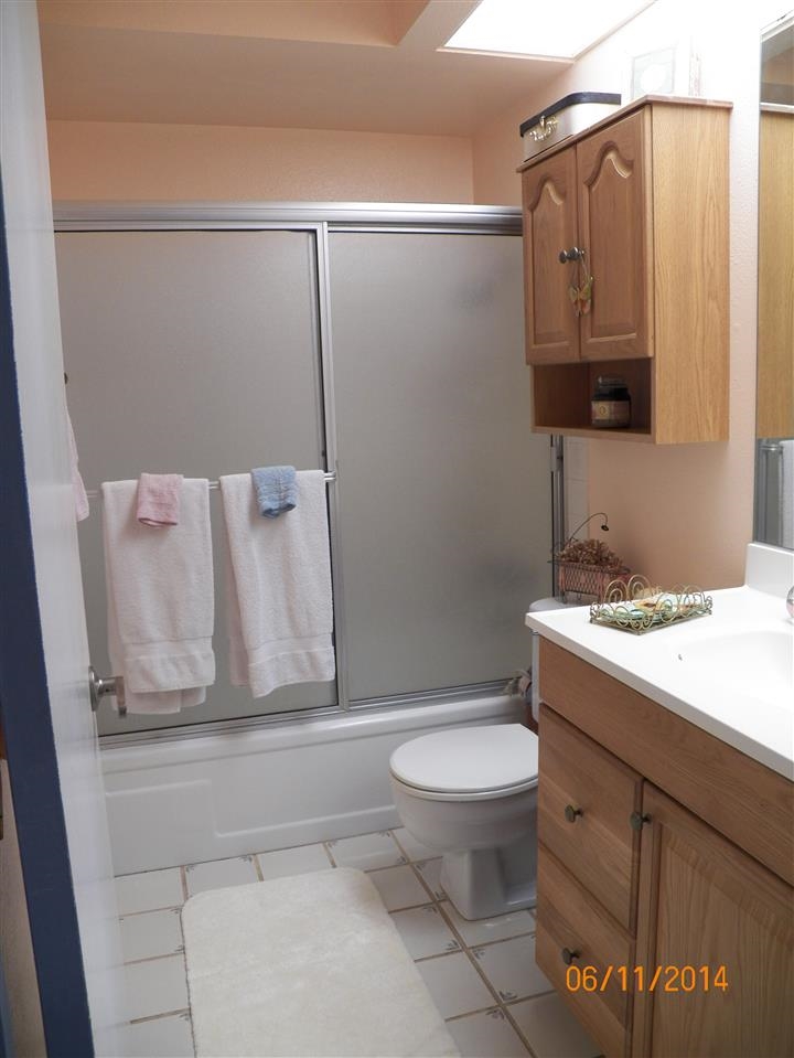 24952 Pappas Road Ramona, CA 92065 - Photo 9 of 21 One of the three full bathrooms.