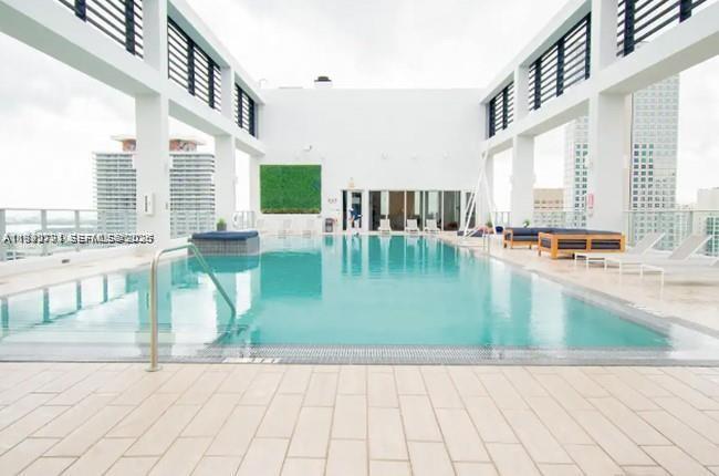 151 Southeast 1st Street, Unit 3111 Miami, FL 33131 - Photo 18 of 35 swimming pool view with seating space