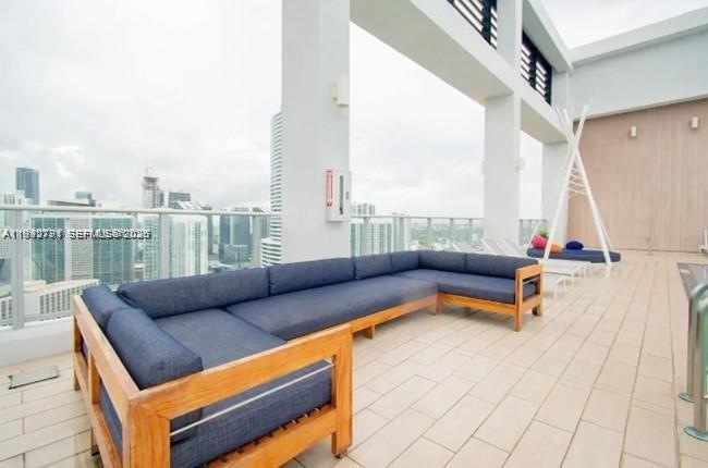 151 Southeast 1st Street, Unit 3111 Miami, FL 33131 - Photo 21 of 35 a building outdoor space with patio furniture
