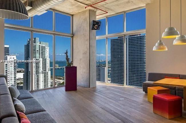 151 Southeast 1st Street, Unit 3111 Miami, FL 33131 - Photo 30 of 35 a view of a chairs and table in the patio