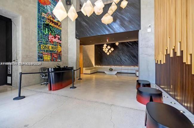 151 Southeast 1st Street, Unit 3111 Miami, FL 33131 - Photo 33 of 35 a room with musical instruments