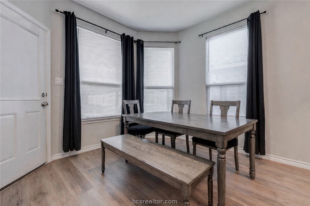 2176 Chief Street Bryan, TX 77807 - Photo 9 of 21 a view of a dining room with furniture and window
