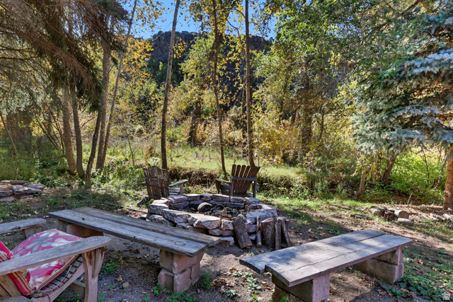 667 North Rapid Creek Road Inkom, ID 83245 - Photo 22 of 29 Stone-built fire pit surrounded by a natural landscape