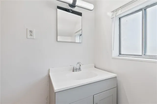 a bathroom with a sink and a toilet