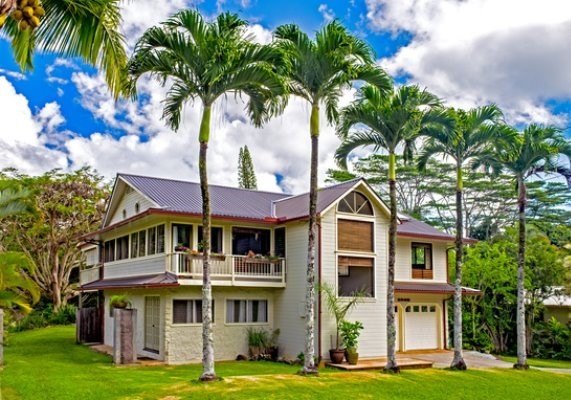 6280 Kalama Road Kapaa, HI 96746 - Photo 1 of 25 a front view of a house with a garden