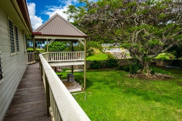 6280 Kalama Road Kapaa, HI 96746 - Photo 22 of 25 a view of a house with a yard