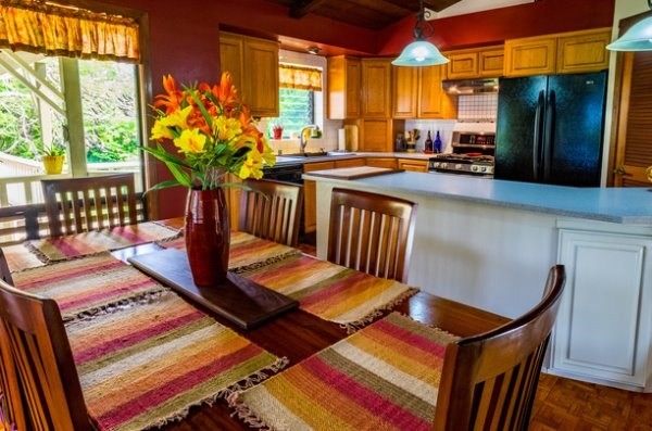 6280 Kalama Road Kapaa, HI 96746 - Photo 6 of 25 a view of a dining room with furniture window and wooden floor
