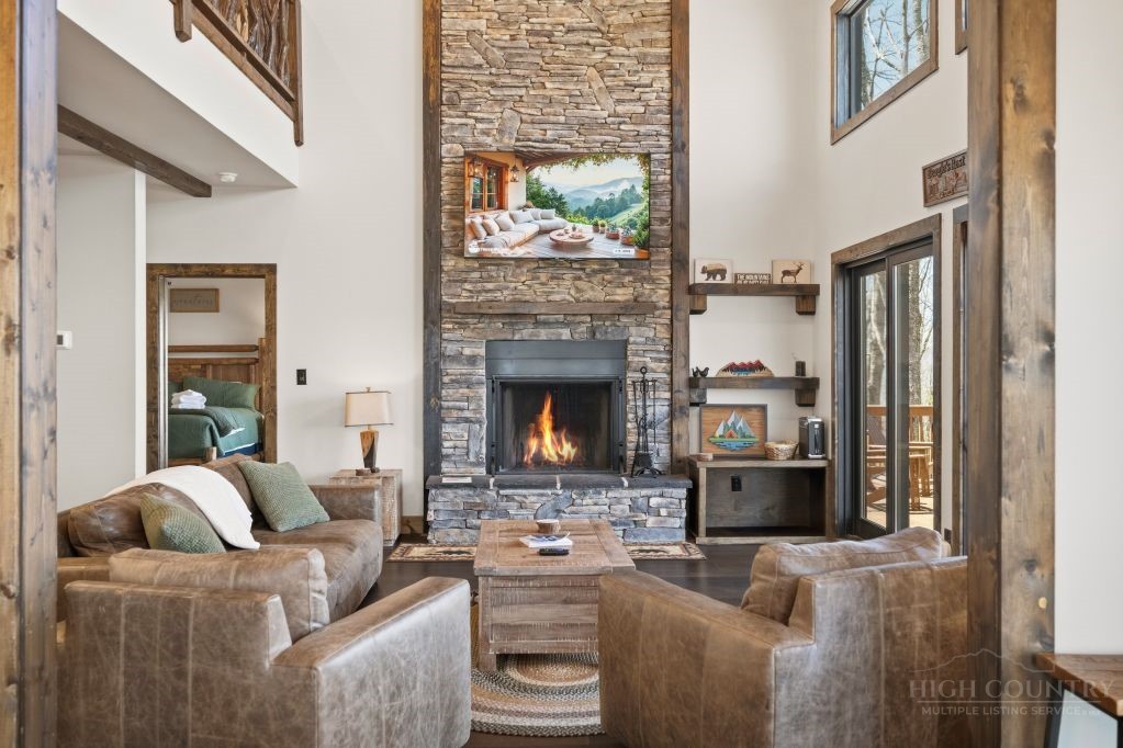 27 Timber Rock Trail Banner Elk, NC 28604 - Photo 13 of 50 a living room with furniture and a fireplace