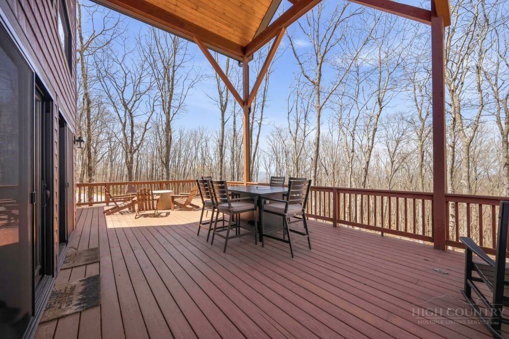 27 Timber Rock Trail Banner Elk, NC 28604 - Photo 18 of 50 a view of a chairs on the roof deck