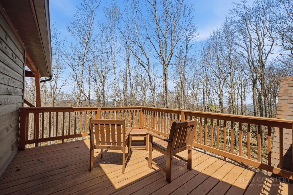 27 Timber Rock Trail Banner Elk, NC 28604 - Photo 30 of 50 a view of balcony with wooden floor and seating space