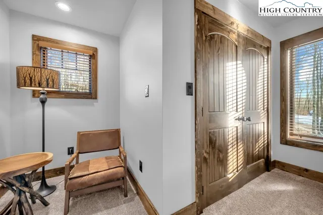 a view of a living room and dining room