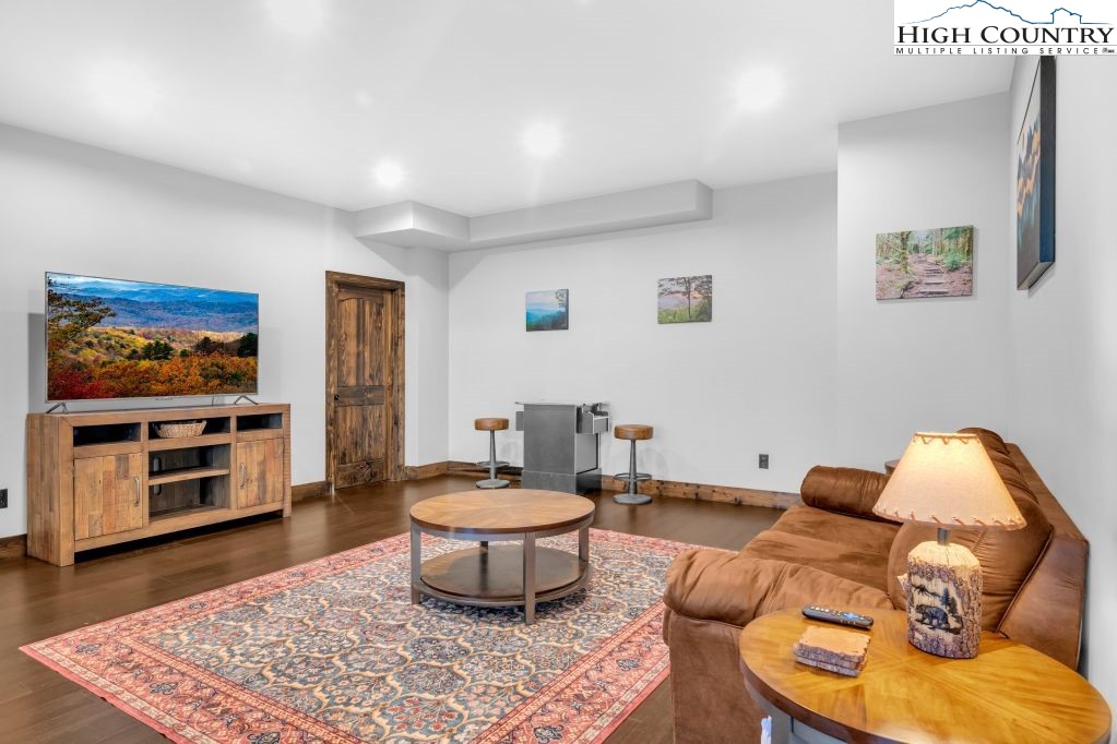 27 Timber Rock Trail Banner Elk, NC 28604 - Photo 32 of 45 a living room with furniture and a rug