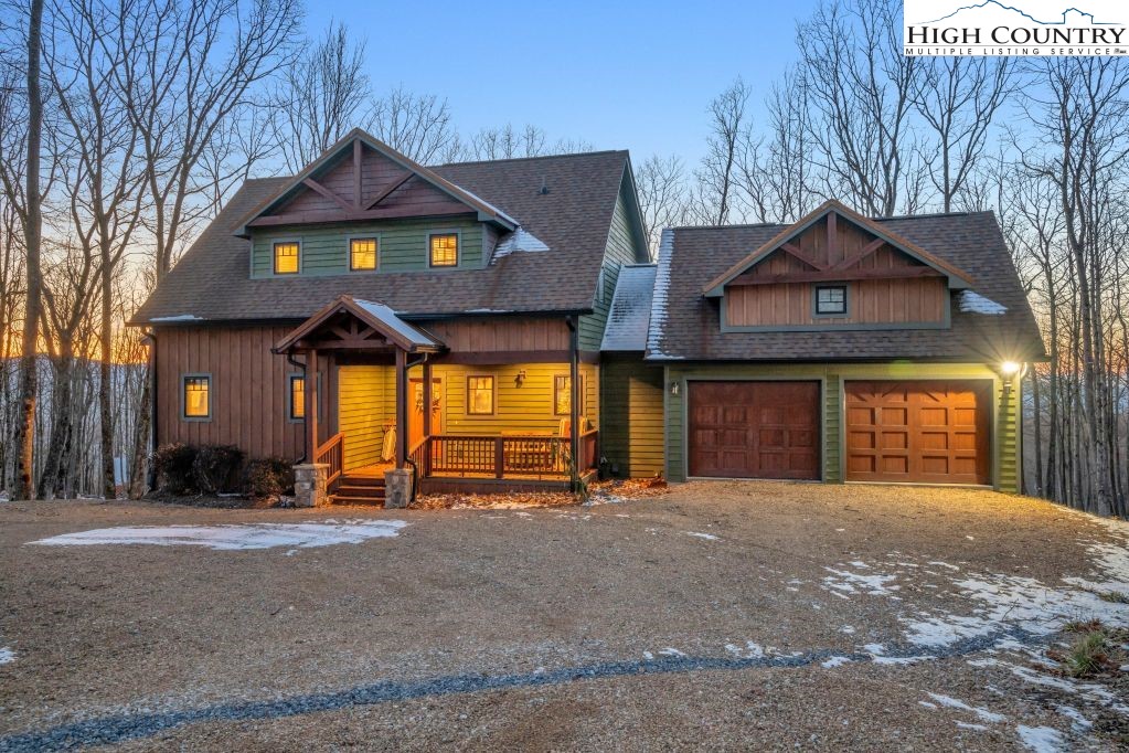 27 Timber Rock Trail Banner Elk, NC 28604 - Photo 39 of 45 a front view of a house with a yard