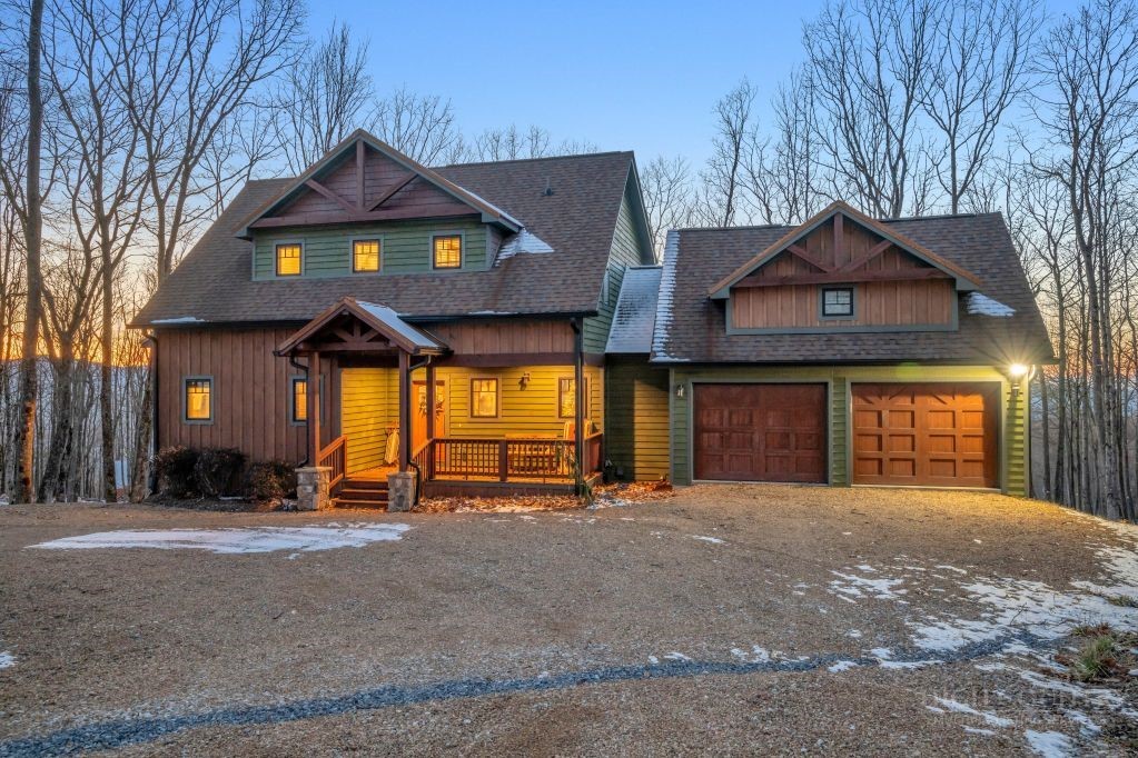 27 Timber Rock Trail Banner Elk, NC 28604 - Photo 45 of 50 a front view of a house with a yard