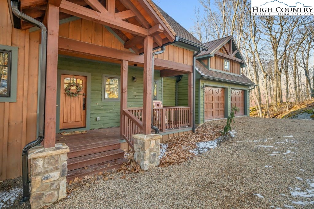 27 Timber Rock Trail Banner Elk, NC 28604 - Photo 8 of 45 a front view of a house with a yard