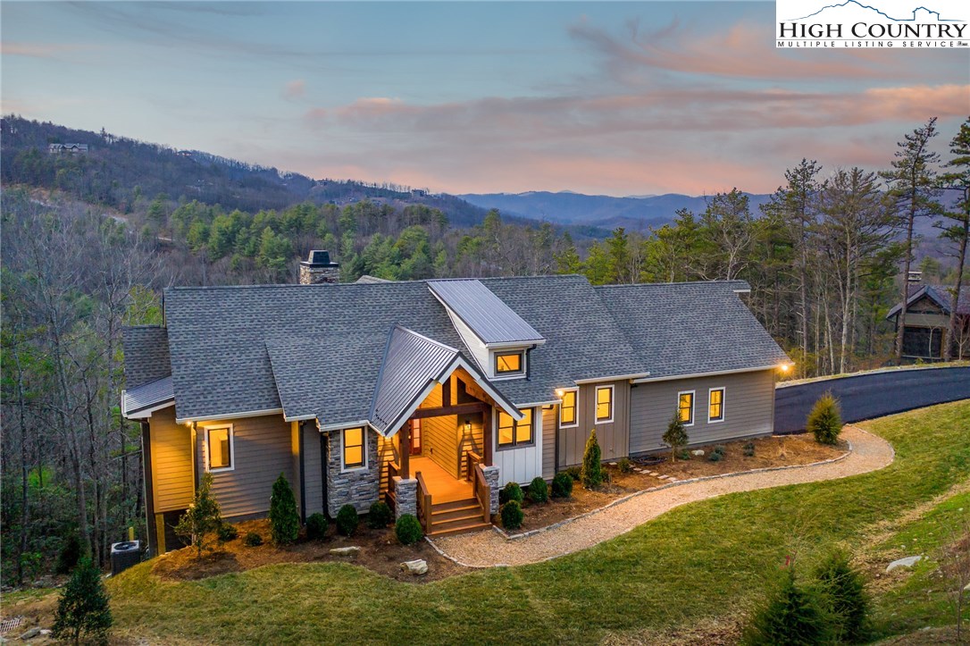 553 Marigold Road Boone, NC 28607 - Photo 19 of 48 an aerial view of residential houses and trees in the background