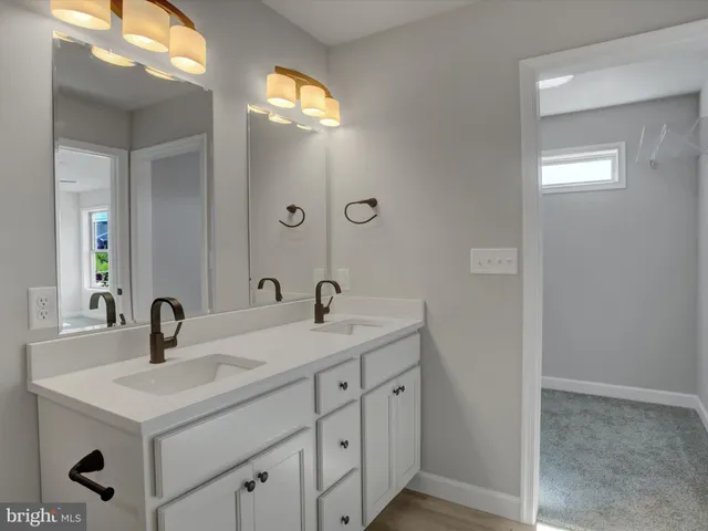 a view of an empty room with glass door