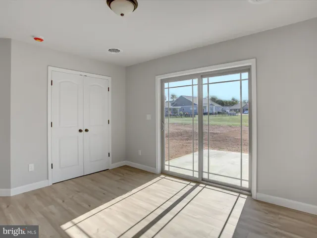 a house with trees in the background