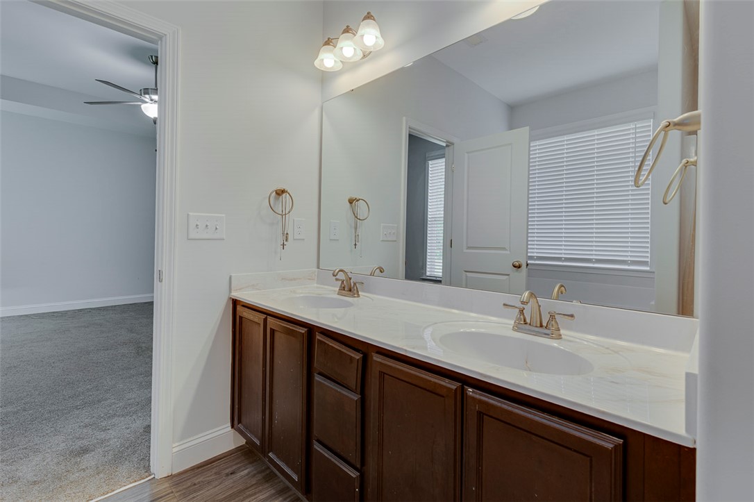 141 Capslock Trail Pendleton, SC 29670 - Photo 30 of 38 Twin vanities with ample counter space offer practical elegance.