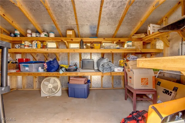 a view of a room with wooden walls