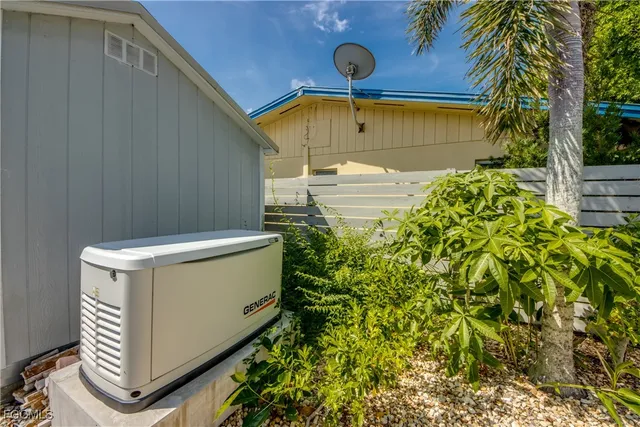 a view of a lobby with furniture and chandelier
