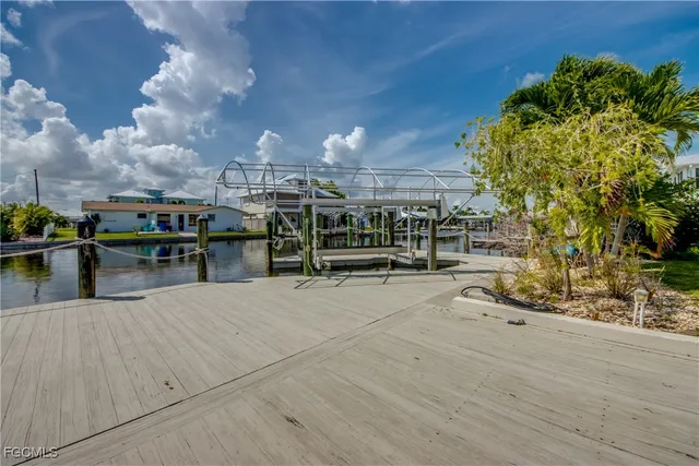a view of a room with lots of wooden furniture