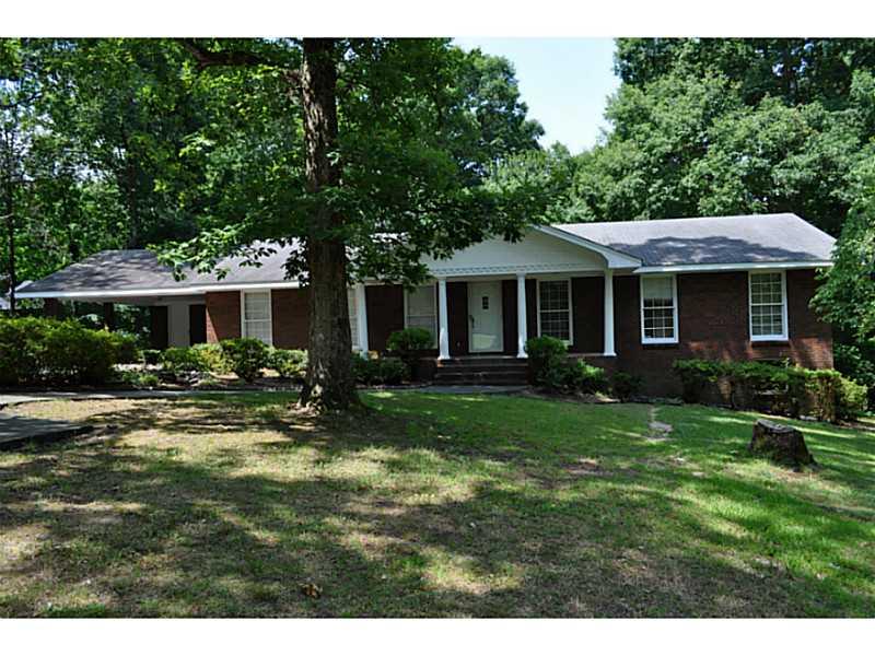 1161 Oak Road Southwest Lilburn, GA 30047 - Photo 1 of 1 Exterior Front. This 4 sided brick home 4 bedroom 2 bath traditional home has so much to offer and is set far away from main road.