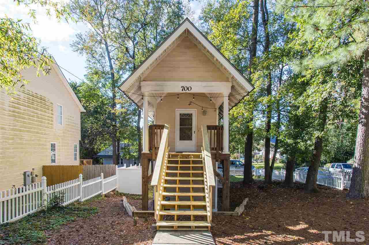 700 Method Road Raleigh, NC 27607 - Photo 1 of 29 a front view of a house with a yard